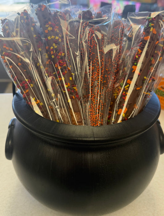 Chocolate dipped pretzel rods fall themed